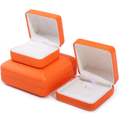 Logo personnalisé Rectangle orange Coffret de bijoux en cuir pour le stockage de collier de bracelet de luxe