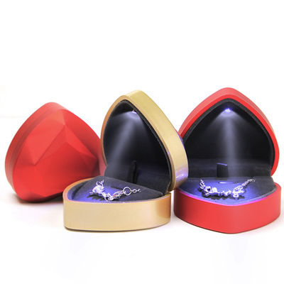 Vente en gros Fabrication de bijoux haut de gamme cadeau Boîte d'emballage Collier personnalisé Ensemble de bijoux d'anneau Emballage plastique en forme de cœur en LED blanc Boîte de bijoux avec logo