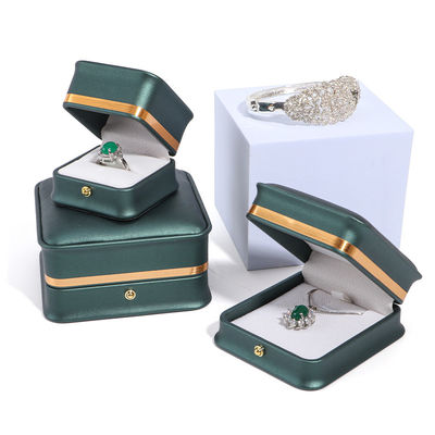Boîte à bijoux en cuir vert foncé avec emballage Hanhong et doublure de velours