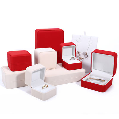 Boîte d'emballage de collier de luxe personnalisé en cuir PU rouge avec doublure de velours et Contactez-nous
