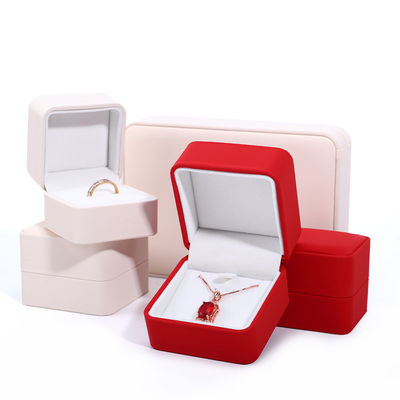 Boîte d'emballage de collier de luxe personnalisé en cuir PU rouge avec doublure de velours et Contactez-nous