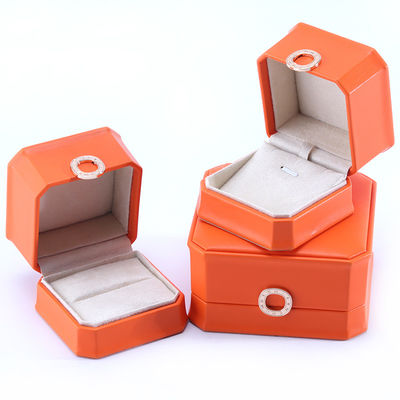 Boîte d'emballage de bijoux en cuir PU carré orange pour bracelet de collier et bague de mariage