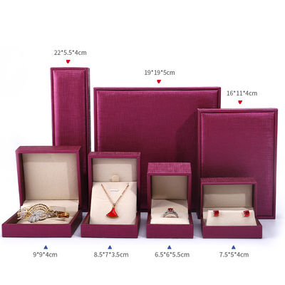 Chine fabrication en gros de bijoux de luxe Boîte d'emballage personnalisée haut de gamme Collier Bracelet Boucle d'oreille Emballage rose Rouge Pu Boîte de bijoux en cuir avec logo