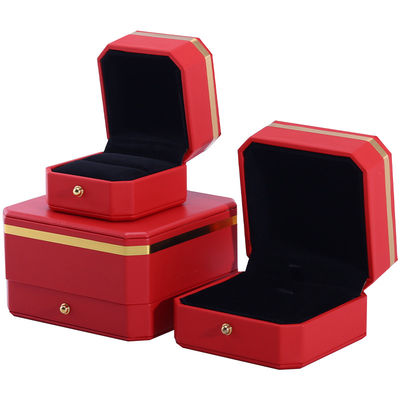 Boîte d'emballage en cuir en PU octagonale rouge et or