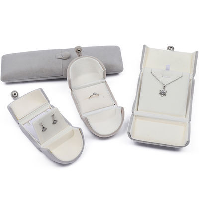 Boîte à bijoux en velours gris en forme de coquille attractive