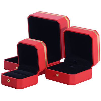 Boîte d'emballage en cuir en PU octagonale rouge et or
