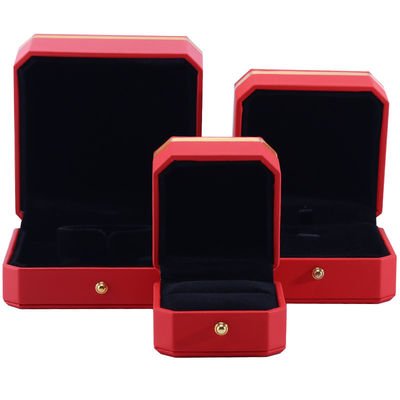 Boîte d'emballage en cuir en PU octagonale rouge et or