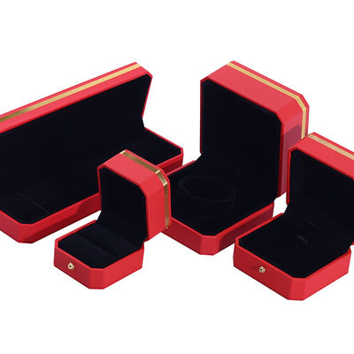 Boîte d'emballage en cuir en PU octagonale rouge et or