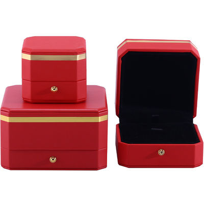 Boîte d'emballage en cuir en PU octagonale rouge et or