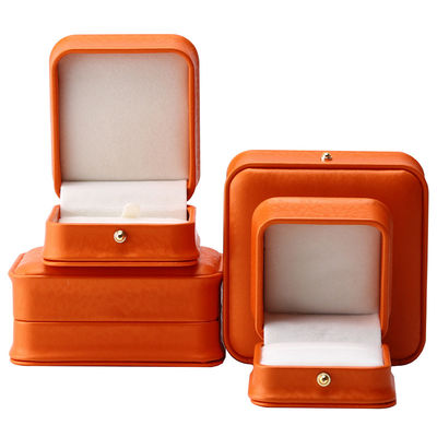 Boîte à bijoux en cuir en PU orange grain de neige noble pour emballage de luxe