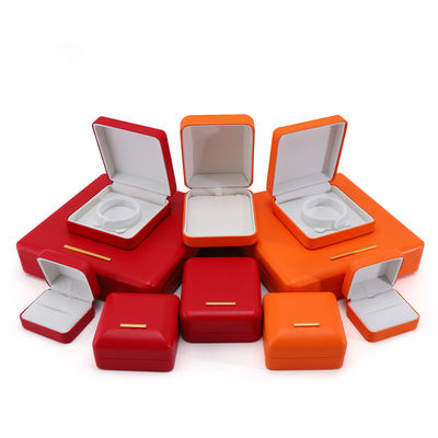Boîte de rangement de bijoux en cuir en PU convexe élégant multicolore pour emballage de luxe