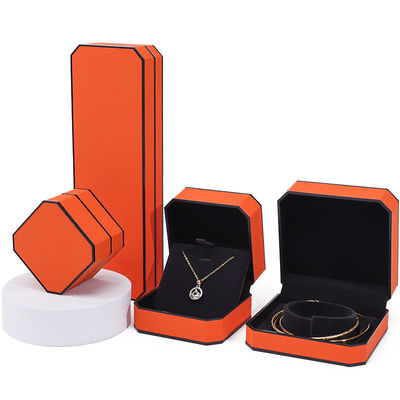 acheter Boîte à bijoux en cuir en PU à bord noir et orange octogonal pour emballage de luxe online manufacture