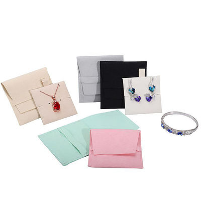 Sac de rangement de bijoux en microfibre à contact doux avec séparateur amovible pour boucles d'oreilles