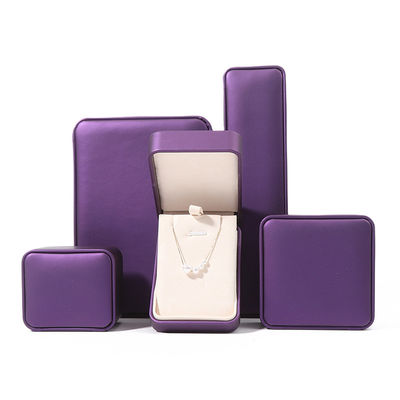 Boîte d'emballage de bijoux de haute qualité Custom Luxe Grand ensemble de bijoux Boîte Collier Bracelet Boucles d'oreilles Anneau Emballage artisanal Carré Pourpre en cuir Boîte de bijoux avec logo