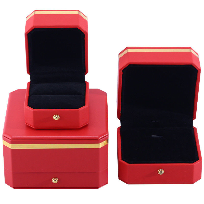 Boîte d'emballage en cuir en PU octagonale rouge et or