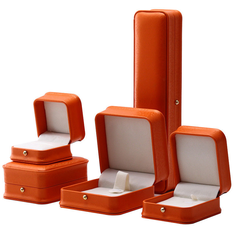 Boîte à bijoux en cuir en PU orange grain de neige noble pour emballage de luxe